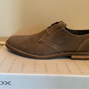 New men shoes worn only once. Size 9.5 casual/dress shoes. Comfortable